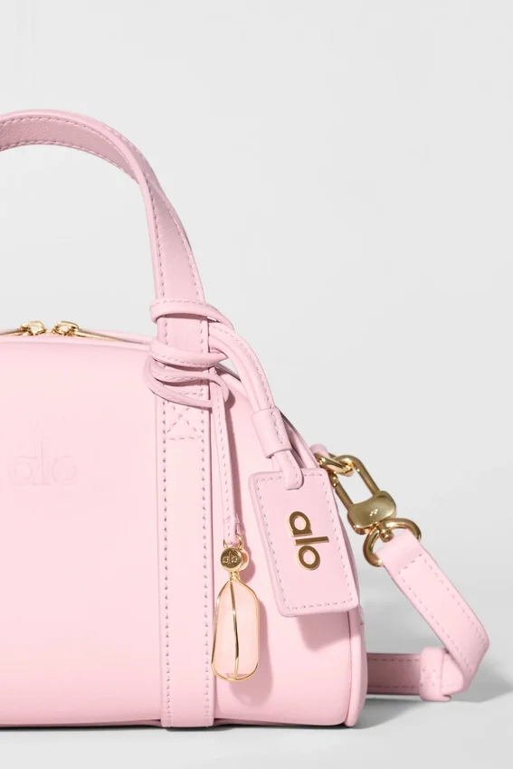 Alo Mini Odyssey – solbleket rosa skinn