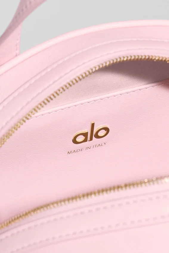 Alo Mini Odyssey – solbleket rosa skinn