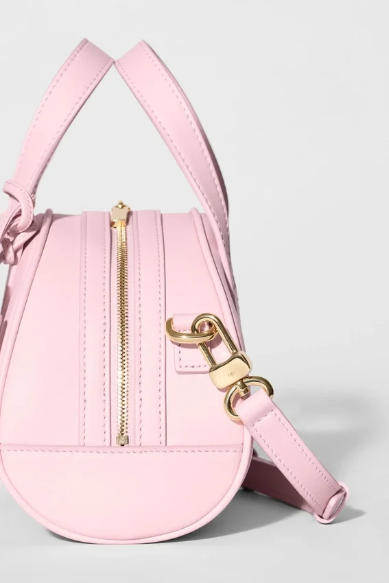 Alo Mini Odyssey – solbleket rosa skinn