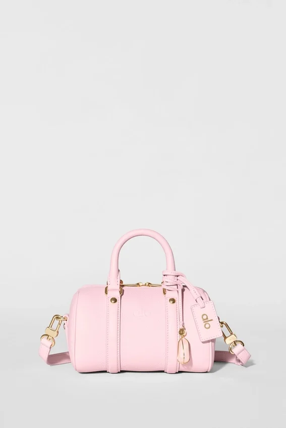 Alo Mini Voyage – solfylt rosa skinn