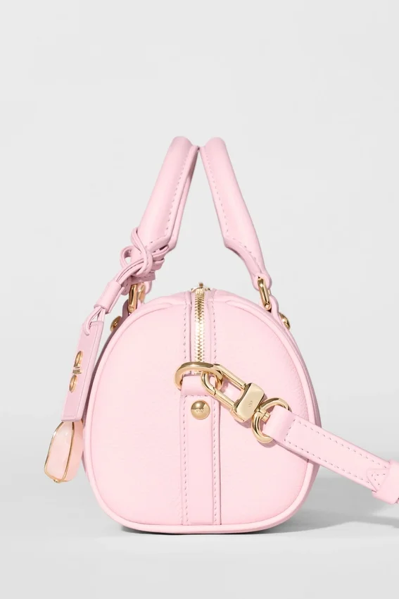 Alo Mini Voyage – solfylt rosa skinn