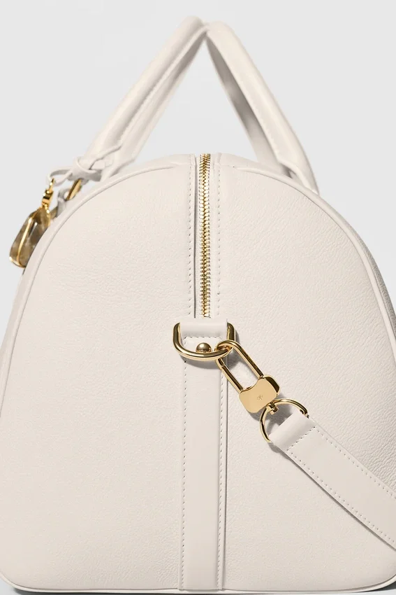 Alo Voyage Duffelbagger – benfarget skinn