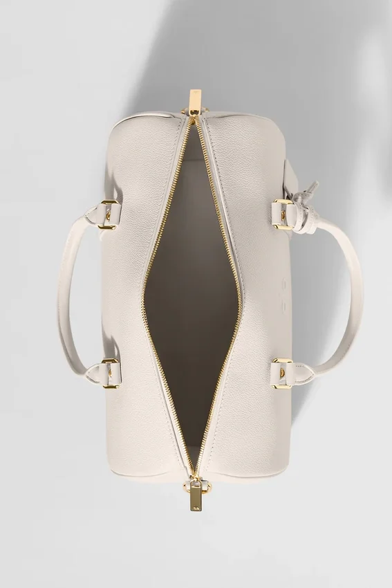 Alo Voyage Duffelbagger – benfarget skinn