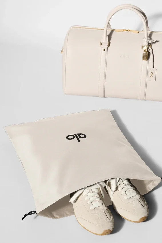 Alo Voyage Duffelbagger – benfarget skinn