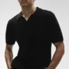 Coastline strikket poloshirt med korte ermer – svart
