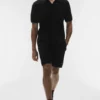 Coastline strikket poloshirt med korte ermer – svart