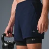 Conquer React 2-i-1 Performance-shorts – marineblå/svart