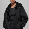 Grand-jakke i imitert shearling – svart