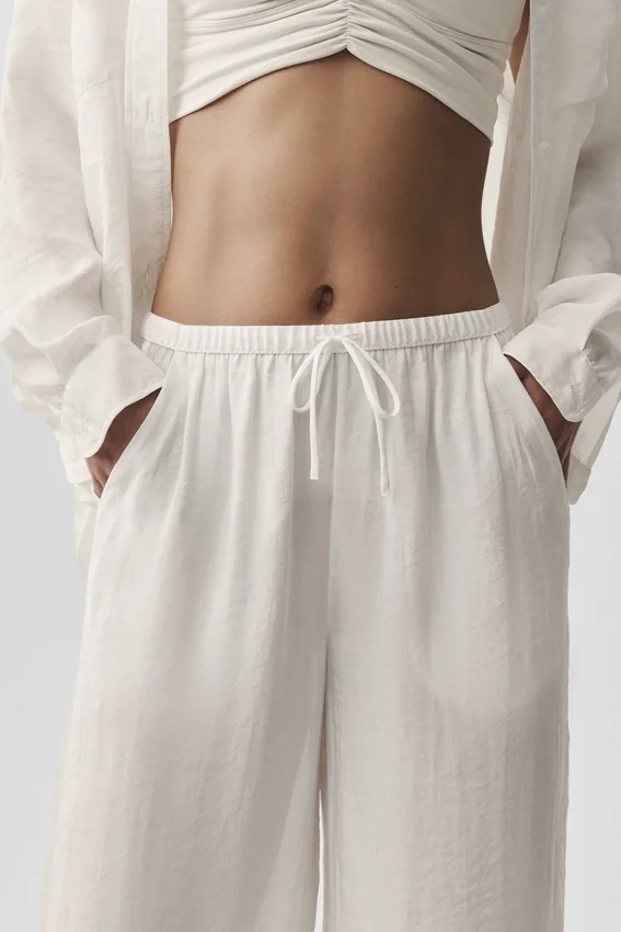 Halvgjennomsiktig Golden Hour-buks med High-Waist og rette ben – elfenben