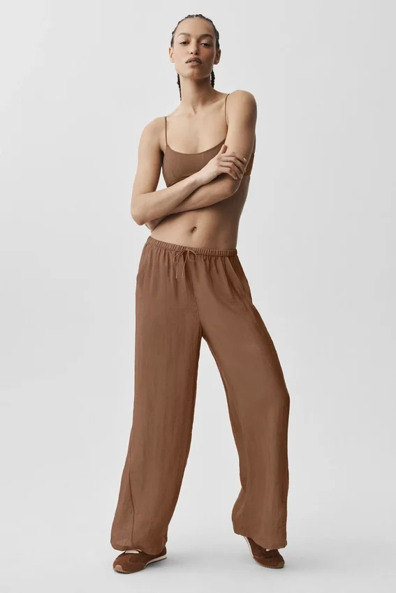 Halvgjennomsiktig Golden Hour-buks med High-Waist og rette ben – solkysset brun