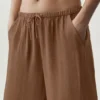 Halvgjennomsiktig Golden Hour-buks med High-Waist og rette ben – solkysset brun