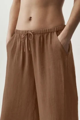 Halvgjennomsiktig Golden Hour-buks med High-Waist og rette ben – solkysset brun