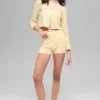 Kort cardigan i ull og kashmir fra New Class – Candlelight Yellow