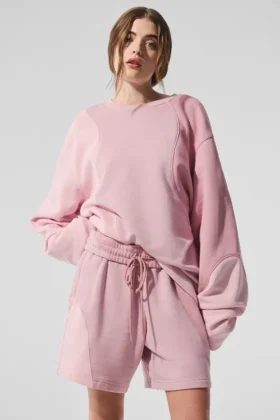 Make Waves genser med rund hals – solnedgangsrosa tonet