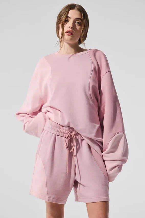 Make Waves genser med rund hals – solnedgangsrosa tonet