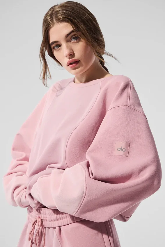 Make Waves genser med rund hals – solnedgangsrosa tonet