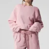 Make Waves genser med rund hals – solnedgangsrosa tonet