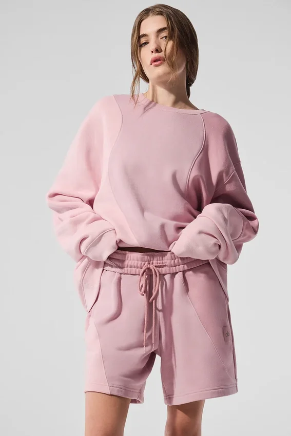 Make Waves genser med rund hals – solnedgangsrosa tonet