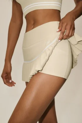 My Serve-tennisskjørt i bomull og kashmir med High-Waist-design – sandbeige/hvit