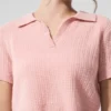 Polo-T-skjorte i myk kashmir med vaffelstrikk – rosa kvarts