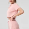 Polo-T-skjorte i myk kashmir med vaffelstrikk – rosa kvarts