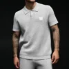Sports Club strikkegenser – Athletic Heather Grey